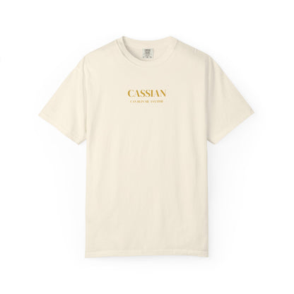 Beige t-shirt with gold text on a white background