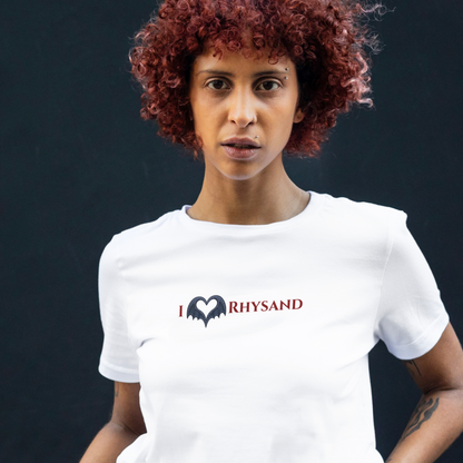 Woman wearing a white t-shirt with 'I ❤️ Rhysand' text on a dark background