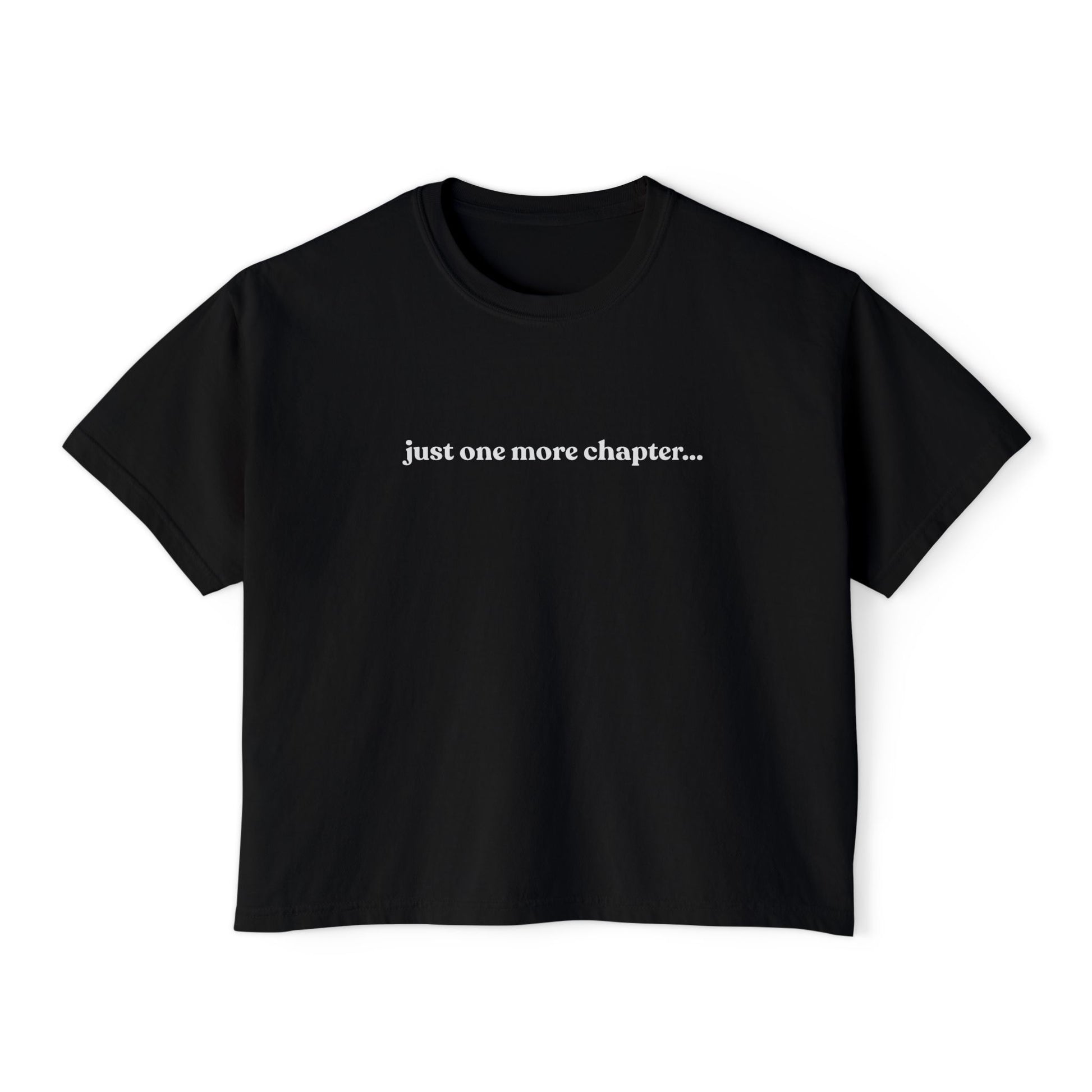 Black t-shirt with 'just one more chapter...' text on a white background