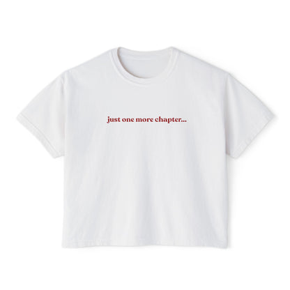 White t-shirt with red text 'just one more chapter...' on a white background